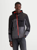 Alpinestars Morfex Parka Waterproof Jacket, men's urban contemporary motorcycle jacket in lunar gray and black, front view on a model wearing the modular textile riding jacket with a contrasting orange front zipper and integrated hood