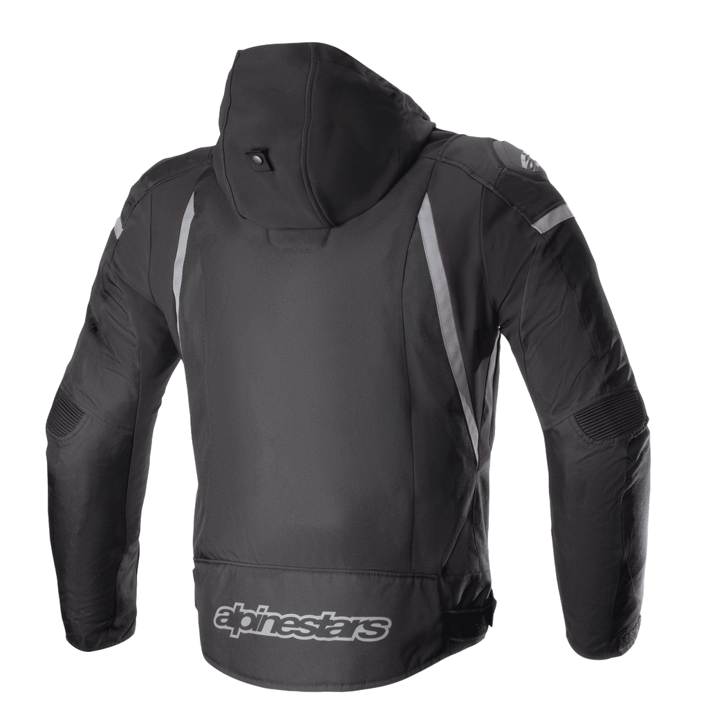 Blouson imperméable Alpinestars Zaca, noir et gris foncé, vue arrière avec capuche amovible, accents réfléchissants gris et logo Alpinestars sur le bas du dos, blouson de moto sport en textile