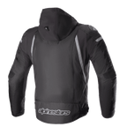 Blouson imperméable Alpinestars Zaca, noir et gris foncé, vue arrière avec capuche amovible, accents réfléchissants gris et logo Alpinestars sur le bas du dos, blouson de moto sport en textile