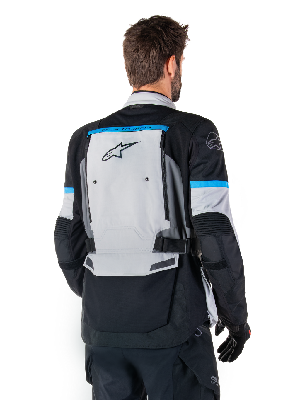 Alpinestars Bogota' Pro Drystar® Jacket, Adventure Motorcycle Jacket, Ice Gray Black and Cyan, back view highlighting the large gray rear panel with Tech Touring branding, cyan accents on sleeves, and durable textile construction.