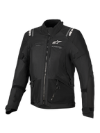 Veste Alpinestars Stella Andes V4 Drystar®, veste de moto pour femme, noire, vue de face présentant des logos blancs sur la poitrine et les épaules, conception textile multi-panneaux avec fermetures éclair et détails réfléchissants, style adventure-touring