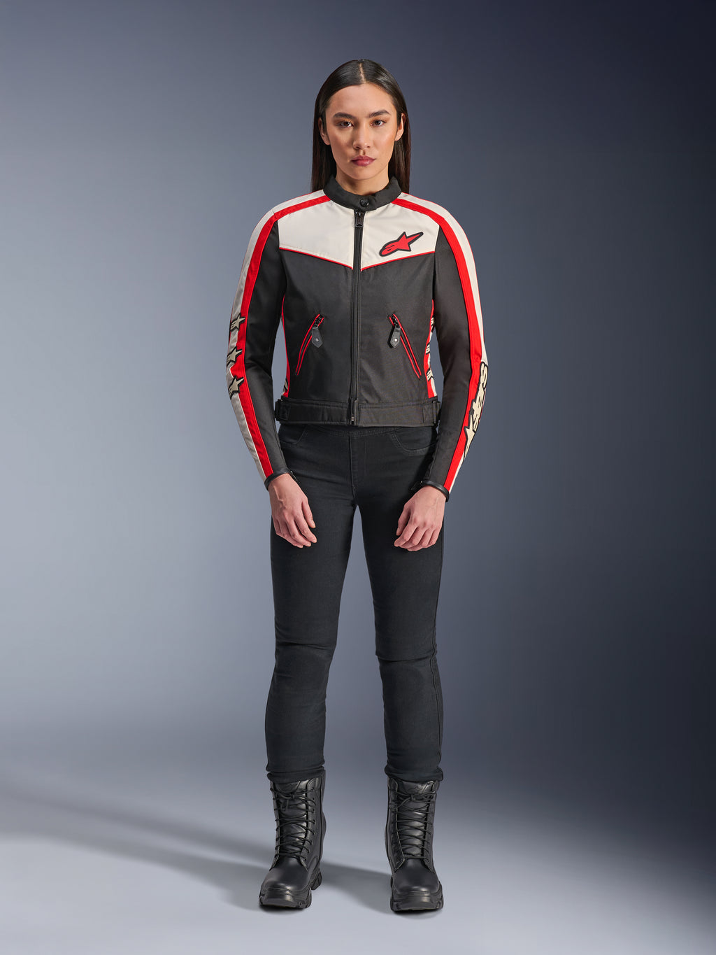Alpinestars Stella T-Dyno WR Jacket, Women's Textile Motorcycle Jacket, Black Ecru and Bright Red, worn by model with black pants and boots, featuring vintage-inspired design with red Alpinestars logo and contrast panels.