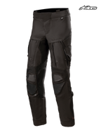 Pantalon Halo Drystar d'Alpinestars, pantalon de moto adventure noir pour homme avec construction en textile et panneaux de ventilation sur les cuisses, vue de face