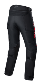 Alpinestars Honda Bogota' Pro Drystar® Pants, Adventure Motorcycle Touring Pants, Black with Red HONDA branding, back view featuring accordion stretch panels at the waist, adjustable straps on the calves, and durable textile construction for multi-season adventure riding.