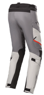 Alpinestars Andes V3 Drystar® Pants, Motorcycle Touring Pants, Ice Gray and Dark Gray, featuring black reinforcement panels and a red accent on the pocket, adjustable waist and calf straps, durable textile construction for adventure riding