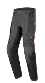 Pantalon Alpinestars Andes Air Drystar®, pantalon de moto touring aventure, noir, doté de larges panneaux en maille pour la ventilation, logo étoile rouge sur la cuisse gauche, sangles de réglage à la taille et sections de genoux renforcées, conçu pour le confort en touring.