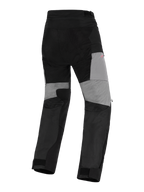 Pantalon Alpinestars Stella Andes V4 Drystar®, pantalon de moto d'aventure pour femme, noir et gris foncé, vue arrière avec panneaux gris à l'arrière des jambes, renforts ripstop durables sur l'assise et zones extensibles pour la mobilité, conception textile imperméable.