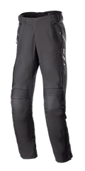Alpinestars Women's Stella Bogota Pro Drystar 4 Seasons Pants, Black Motorcycle Touring Pants, featuring accordion stretch panels at the knees, zippered thigh vents, and adjustable waist buckles, technical textile adventure gear