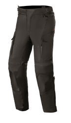 Alpinestars Stella Andes V3 Drystar pour femme, pantalon de touring moto noir, construction textile imperméable et respirante, panneaux renforcés aux genoux et aux cuisses, aérations zippées aux cuisses, poches cargo et taille ajustable pour le touring d'aventure.