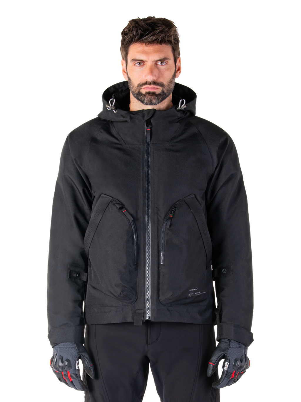 Alpinestars Morush Waterproof Parka, veste de moto urbaine noire pour homme avec capuche et grandes poches zippées.
