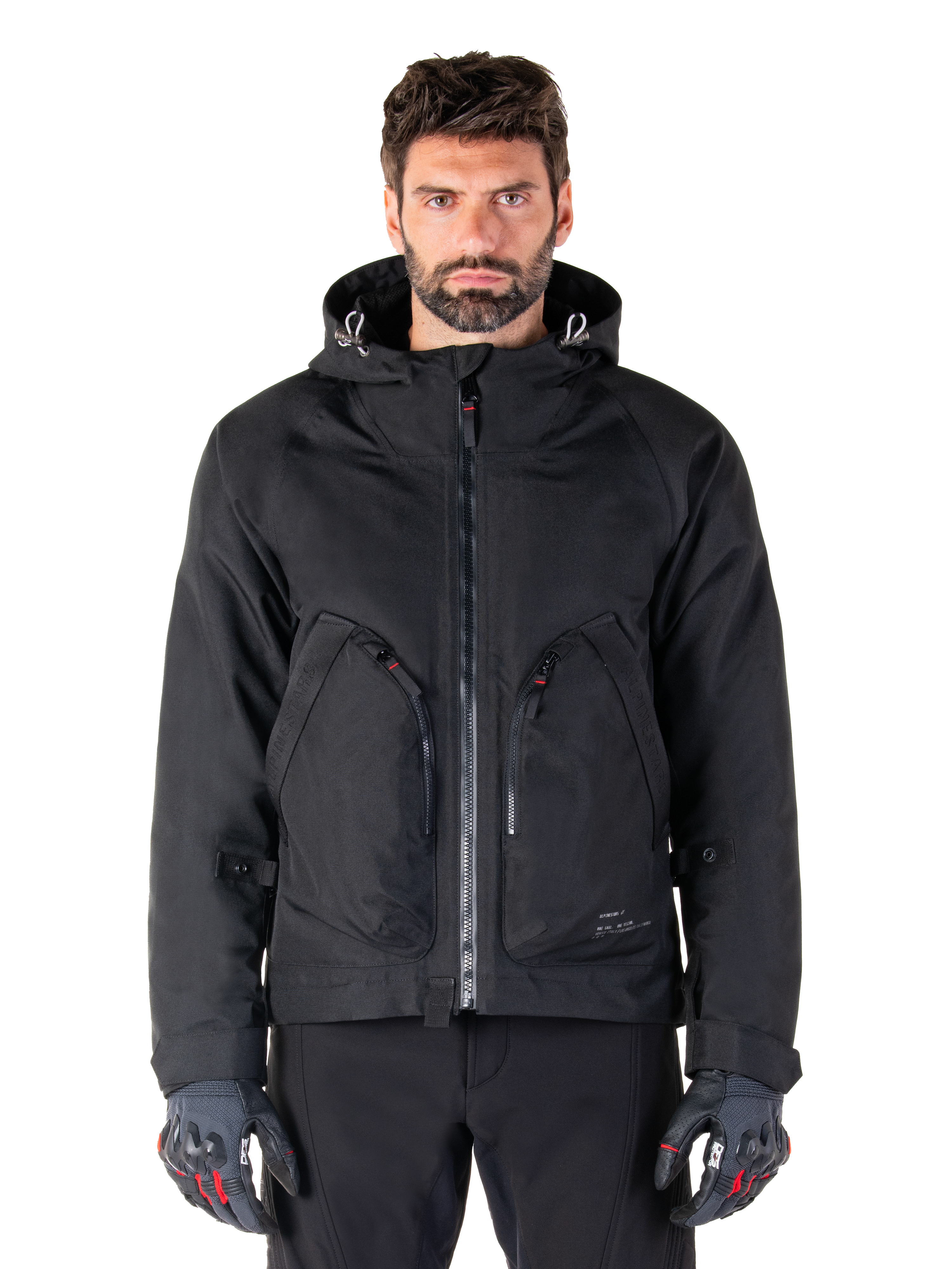 Alpinestars Morush Waterproof Parka, veste de moto urbaine noire pour homme avec capuche et grandes poches zippées.