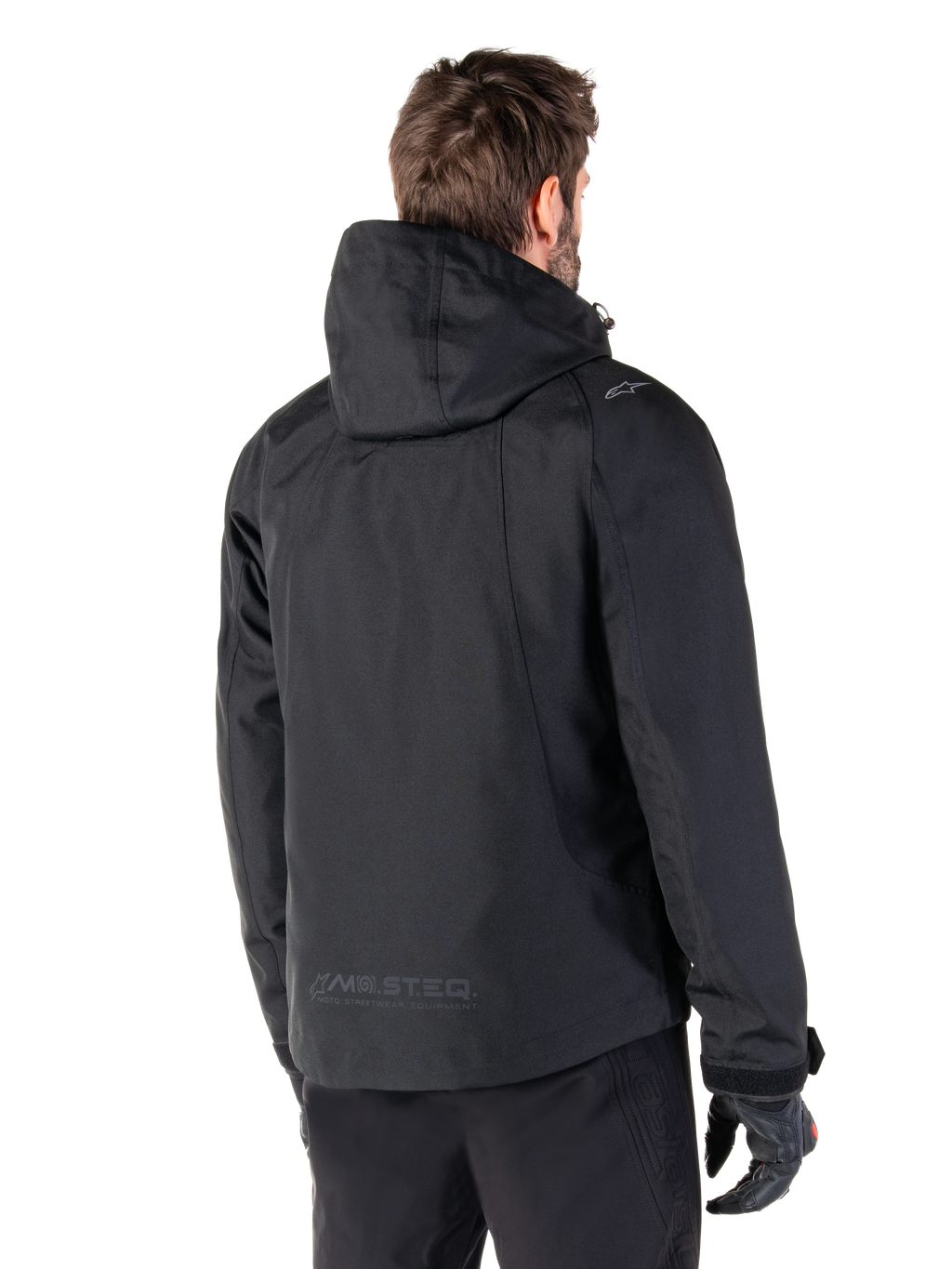 Parka imperméable Alpinestars Morush, veste de moto urbaine noire pour homme, vue de dos à capuche avec marquage MO.ST.EQ.