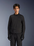 Alpinestars Aeroshell Airflow Jacket in Black Anthracite, lightweight motorcycle jacket with laser-perforated ventilation on the chest and sleeves, breathable mesh panels, and a sleek sport-cut design, worn by a model with black riding gloves.