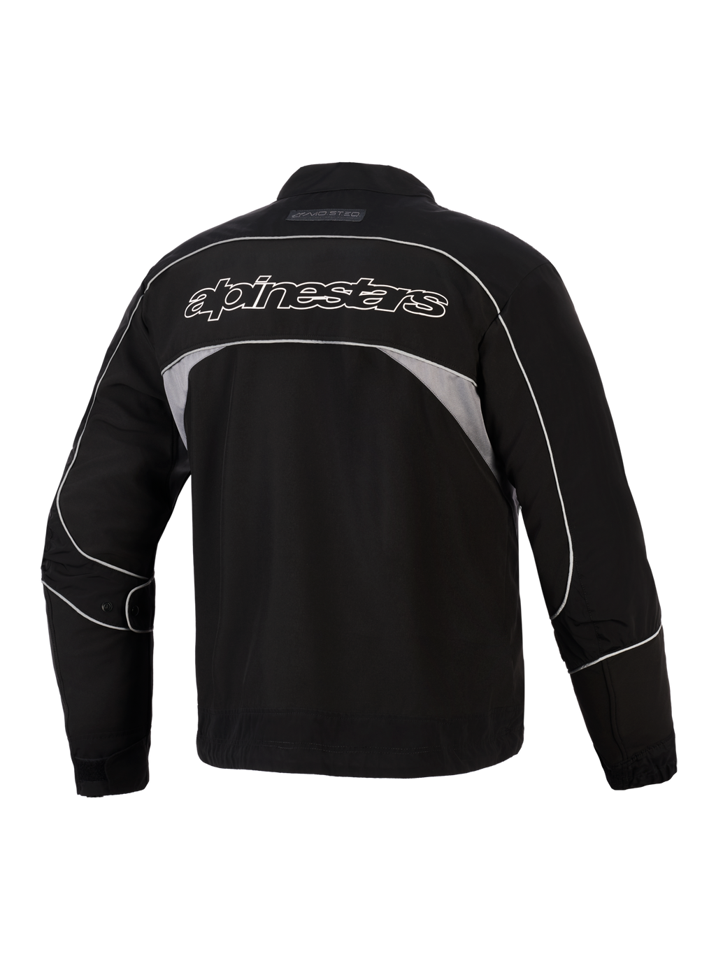 Veste Alpinestars Unite, vue arrière, noire avec panneaux réfléchissants gris foncé, logo Alpinestars à contour blanc dans le dos, veste de moto urbaine en softshell au design minimaliste