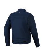 Veste Alpinestars Bruiser, veste de moto urbaine, bleu foncé, vue arrière présentant une construction en sergé de polycoton extensible, petit logo blanc sur la nuque, œillets de ventilation sur les manches et pattes de réglage à la taille.