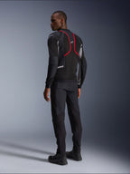 Alpinestars Troop-Air Pro Jacket, Motorcycle Jacket, Black Ash Gray and Bright Red, back view on model, featuring red accent lines and mesh ventilation panels, worn with black pants and boots, urban motorcycle style
