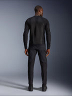 Veste Alpinestars Troop-Air en Black Black, vue arrière montrant le panneau dorsal en maille technique et la construction ventilée, associée à un pantalon de moto et des bottes noirs assortis
