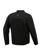 Veste Alpinestars Provoke, veste de moto textile, noire, vue arrière montrant les panneaux en softshell ripstop et un petit logo blanc sur le haut du dos, design urbain technique pour les trajets quotidiens à moto