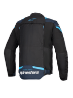 Veste Alpinestars T-Stunt Air, veste de moto, noir, bleu foncé et bleu vif, vue arrière montrant un large panneau dorsal modulaire avec fermetures éclair, logo Alpinestars et texte 'Racing Ahead' dans le bas du dos.