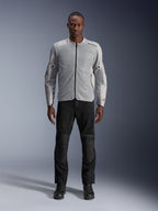 Veste Alpinestars C-1 Air en argent, veste de moto urbaine en textile pour homme avec panneaux en mesh aérés, portée par un mannequin avec un pantalon de moto noir et des bottes noires, style urbain contemporain
