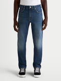 Alpinestars Flex-AST 8 Denim Pants, men's urban motorcycle riding jeans in medium blue, front view on a model wearing casual sneakers, AA-rated single-layer denim with protective features