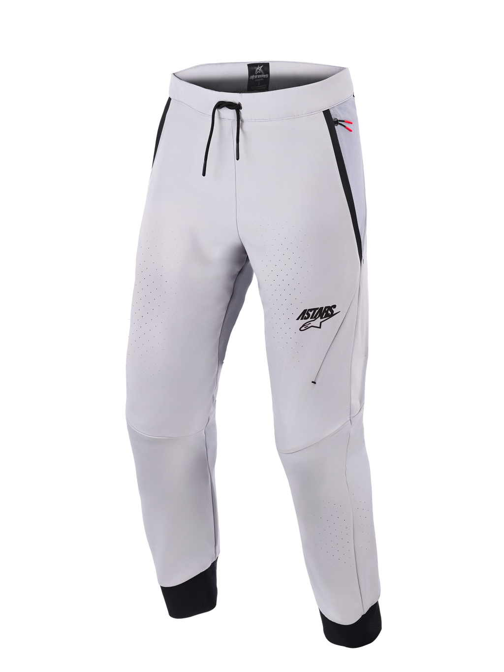 Alpinestars Aeroshell Airflow Pants, pantalon de moto gris moyen, doté de zones de ventilation perforées au laser, logo ASTARS sur la cuisse gauche, taille à cordon de serrage et poignets de cheville noirs, design softshell technique pour la conduite sportive et urbaine