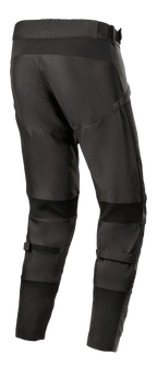 Alpinestars T SP-5 Rideknit® Pants, pantalon de moto en textile, noir, vue arrière mettant en évidence le profil dorsal haut et la coupe conique, avec panneaux extensibles en technologie tricotée derrière les genoux et aux chevilles, sangles de mollet réglables, équipement de route haute performance