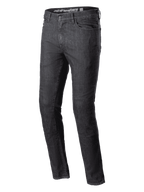 Alpinestars Cerium Denim Tech Riding Pants, jean de moto, noir délavé, coupe ajustée, design classique à cinq poches, construction en denim robuste, passants de ceinture, fermeture par bouton et éclair, équipement de moto urbain contemporain