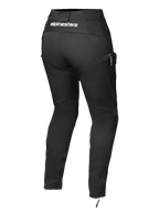 Pantalon pour femme Alpinestars Actea, noir, vue arrière avec logo blanc sur la ceinture, silhouette fuselée avec poche cargo latérale, fermetures éclair aux chevilles, pantalon de moto moderne