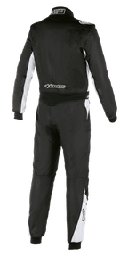 Combinaison Alpinestars Atom FIA, combinaison de course automobile, noir et argent, vue arrière, avec des accents blancs sur les manches et les jambes, marquage Alpinestars dans le bas du dos, conception durable en aramide pour le sport automobile professionnel