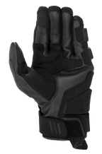 Gants en cuir Alpinestars Phenom, gants de moto, noir, vue de la paume et de profil montrant la construction en cuir de chèvre premium, zones de renfort latérales et de réception, manchette courte avec fermeture auto-agrippante, bouts des doigts compatibles avec les écrans tactiles, équipement de performance sportive
