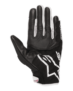 Gants de moto femme Alpinestars Stella SMX-2 Air Carbon V2, vue de la paume, noir et blanc avec détails fuchsia, conception en cuir et mesh avec paume renforcée et bouts des doigts compatibles avec les écrans tactiles.