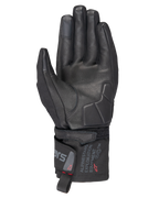 Gants thermiques Alpinestars WT-3 Drystar®, gants de moto noirs, vue de la paume montrant le renfort en cuir et la paume rembourrée, manchette mi-longue avec marquage Alpinestars Exploration Equipment, bout des doigts compatibles avec les écrans tactiles, protection de randonnée durable par tous les temps.