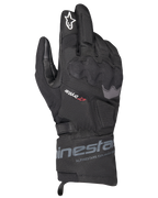 Gants Alpinestars WT-3 Drystar Thermiques, gants de moto de randonnée noirs, construction imperméable et isolée avec protection des articulations moulée, logo étoile blanche sur l'index et manchette mi-longue avec marquage Alpinestars.