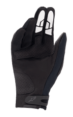 Gants Alpinestars Thermo Shielder, gants de motocross noirs, vue côté paume montrant la construction en daim synthétique, renforts perforés, motifs d'adhérence en silicone blanc sur les doigts et bride de fermeture avec logo au poignet.