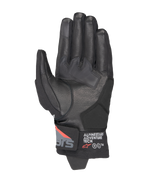 Gants Alpinestars Corozal V3 Drystar®, Noir Gris Foncé Rouge Fluo, vue de la paume avec construction en cuir, renforts de paume synthétiques et manchette courte avec marquage Alpinestars Adventure Tech