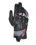 Alpinestars Corozal V3 Drystar®, gants de moto aventure, noir avec accents gris foncé et rouge fluo, vue de dessus montrant la protection d'articulation SP recouverte de cuir, construction en textile et cuir, manchette courte, équipement de protection imperméable