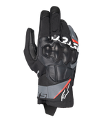 Alpinestars Corozal V3 Drystar®, gants de moto aventure, noir avec accents gris foncé et rouge fluo, vue de dessus montrant la protection d'articulation SP recouverte de cuir, construction en textile et cuir, manchette courte, équipement de protection imperméable
