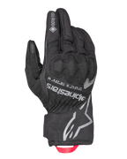 Gants isolés Alpinestars Crestone GORE-TEX, gants de moto touring noirs, revers en textile imperméable et respirant, protection des articulations intégrée, logo Alpinestars et coordonnées argentés, boucle de traction rouge