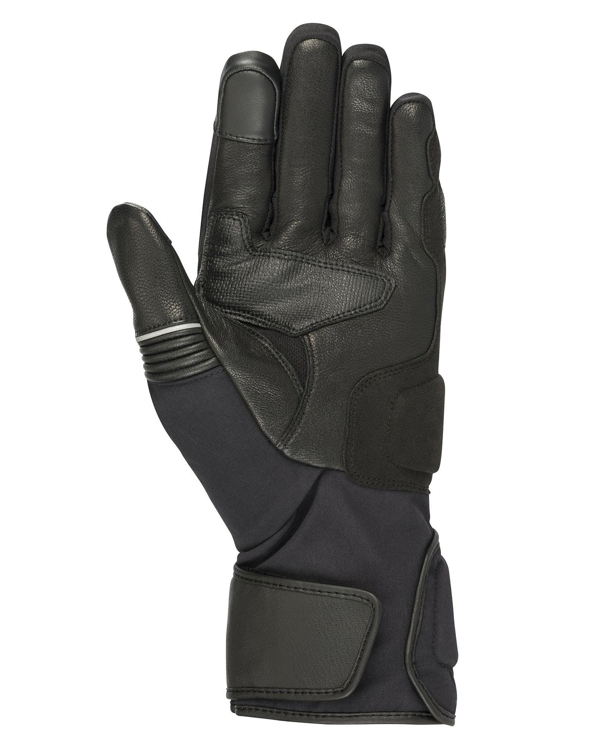 Gants Alpinestars Jet Road V2 GORE-TEX, noirs, vue de la paume montrant la construction en cuir avec rembourrage renforcé, manchette longue et bouts des doigts compatibles avec les écrans tactiles pour le tourisme d'aventure.