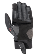 Gants Alpinestars Hyde XT Drystar® XF, gants de moto, noir, vue de la paume présentant des textures en daim synthétique renforcé et en cuir, logo Drystar XF Extra Flow sur le pouce, manchette mi-longue avec sangle de poignet sécurisée, design adventure touring