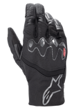 Gants Alpinestars Hyde XT Drystar® XF, gants de moto noirs, protection de jointures viscoélastique ondulée avec accent rouge, manchette mi-longue avec logo étoile argenté, construction en textile imperméable et daim synthétique, équipement de touring aventure