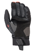 Gants Alpinestars Hyde XT Drystar® XF, gants de moto, noir et rouge feu, vue de la paume montrant la construction en daim synthétique renforcé, marquage Drystar XF sur la zone du pouce et sangle de poignet réglable