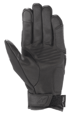 Gants Alpinestars Syncro V2 Drystar®, gants de moto urbains, noir et gris moyen, vue de la paume avec construction en daim synthétique, renforts rembourrés, bout du doigt compatible avec les écrans tactiles et sangle velcro au poignet avec logo Alpinestars
