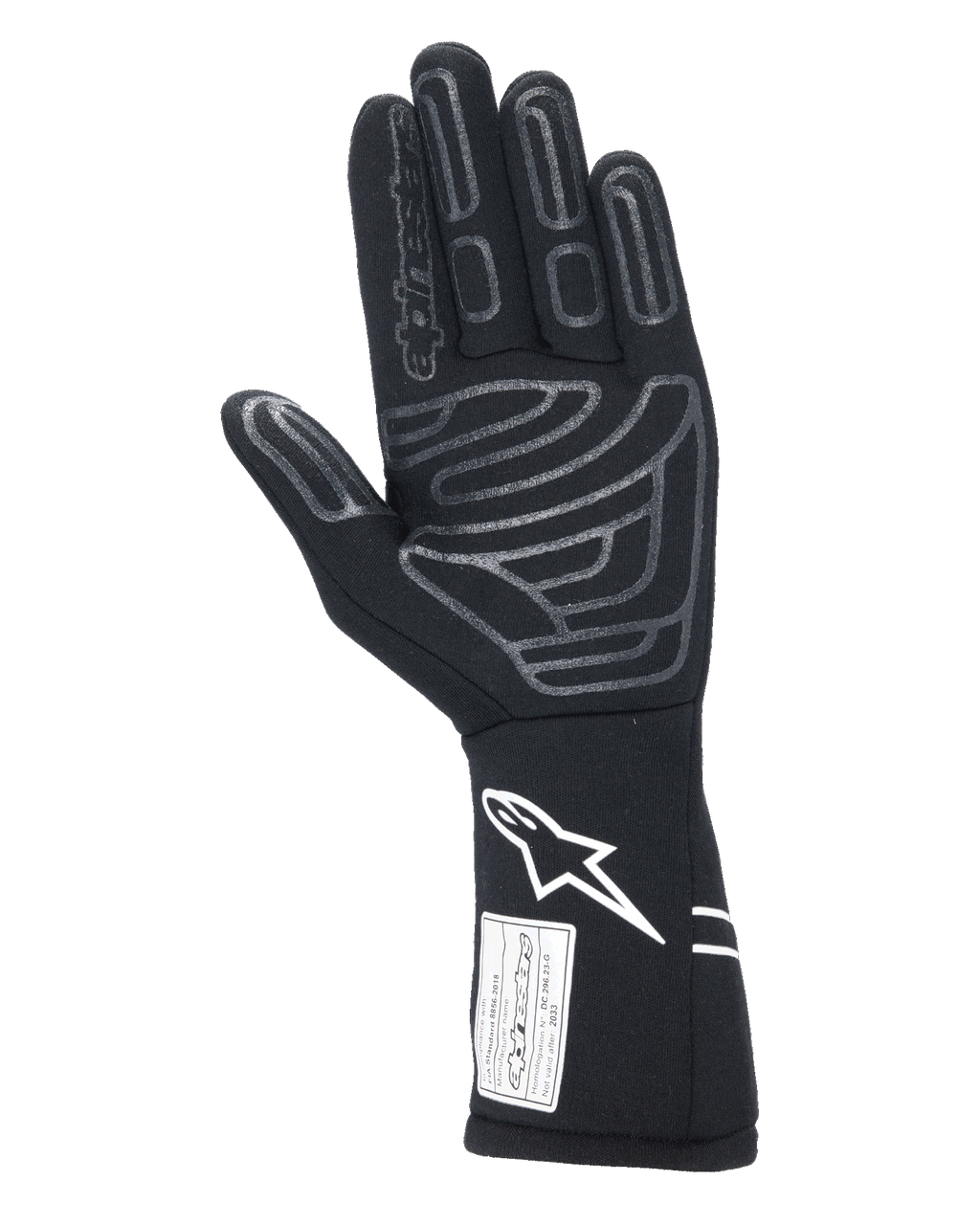 Gants Alpinestars Tech-1 Start V4 FIA, gant de course automobile noir, vue de la paume présentant des motifs d'adhérence en silicone gris sur les doigts et la paume, logo Astars blanc sur la manchette allongée, étiquette d'homologation FIA, équipement de sport automobile professionnel