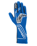 Gants Alpinestars Tech-1 Start V4 FIA, gants de course automobile, bleu royal, avec marquage géométrique blanc et logos d'étoile noirs, manchette allongée avec lettrage Alpinestars vertical, conception sans couture pour une performance légère, équipement de course professionnel homologué FIA