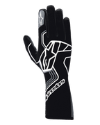 Gants Alpinestars Tech-1 Race V4, gants de course automobile, noir et gris, avec un grand logo étoile géométrique blanc, marquage Alpinestars sur la manchette et l'index, style manchette longue pour le sport automobile haute performance