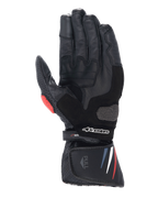 Gants Alpinestars Honda SP-8 V3, gants de moto, noirs avec accents rouges et bleus, vue de la paume montrant la construction en cuir pleine fleur, curseur de paume renforcé, détails perforés et manchette étendue avec logo Alpinestars