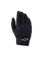 Gants Alpinestars Ignite, gants de moto urbains, noirs, dotés d'un dessus en mesh respirant, d'une protection des articulations NUCLEON PLASMA et d'un logo Alpinestars étoilé blanc au poignet.