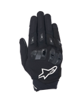 Gants Alpinestars SP X 3, gants de moto à manchette courte noirs et blancs, vue de dessus montrant la protection des articulations en TPU double densité, un grand logo étoile blanc et des protections sur les doigts, conçus pour la conduite sportive et sur route
